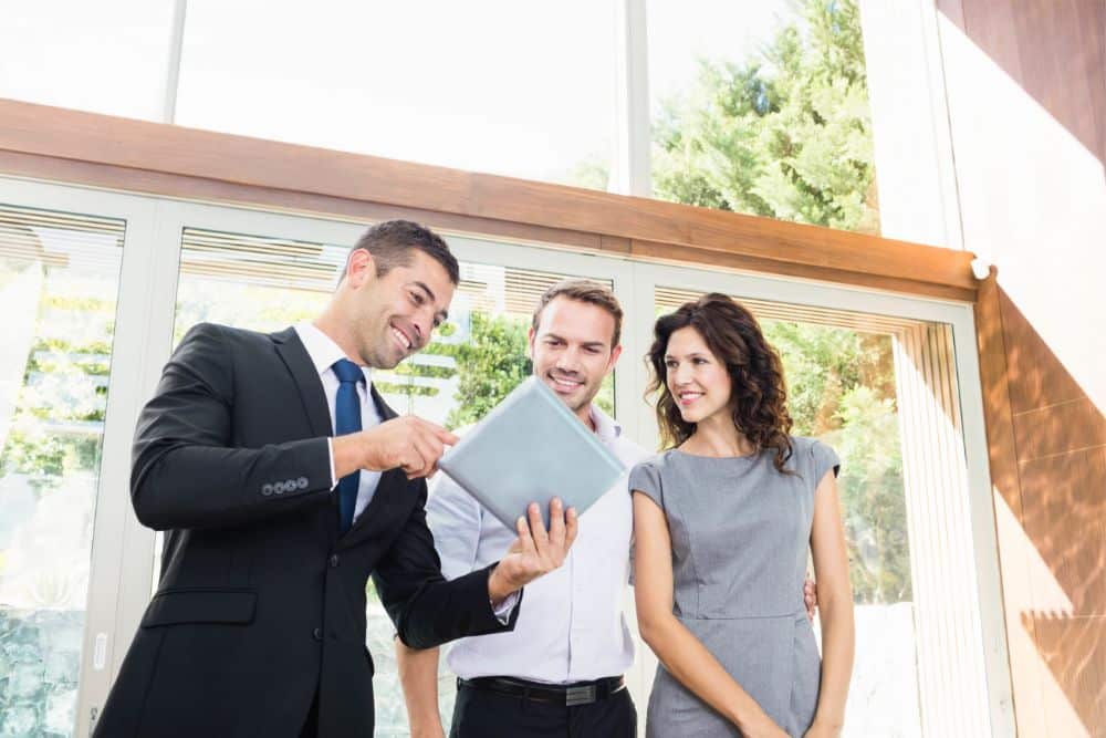 Real estate advisor reviewing an investment plan